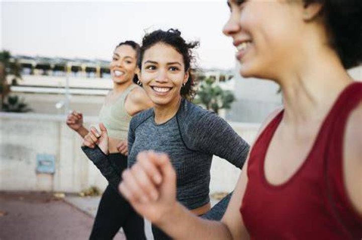 Active woman getting ready with hair supplies