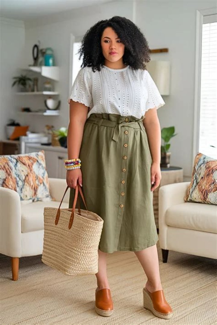Curvy woman gardening in linen summer outfit