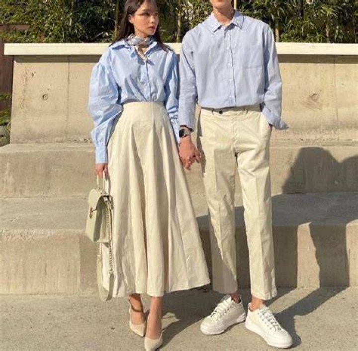 Cute couple coordinating outfits at baseball game