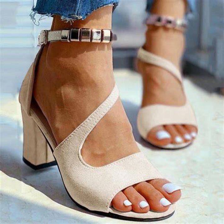 Elegant beige block heel sandals suitable for walking on sand