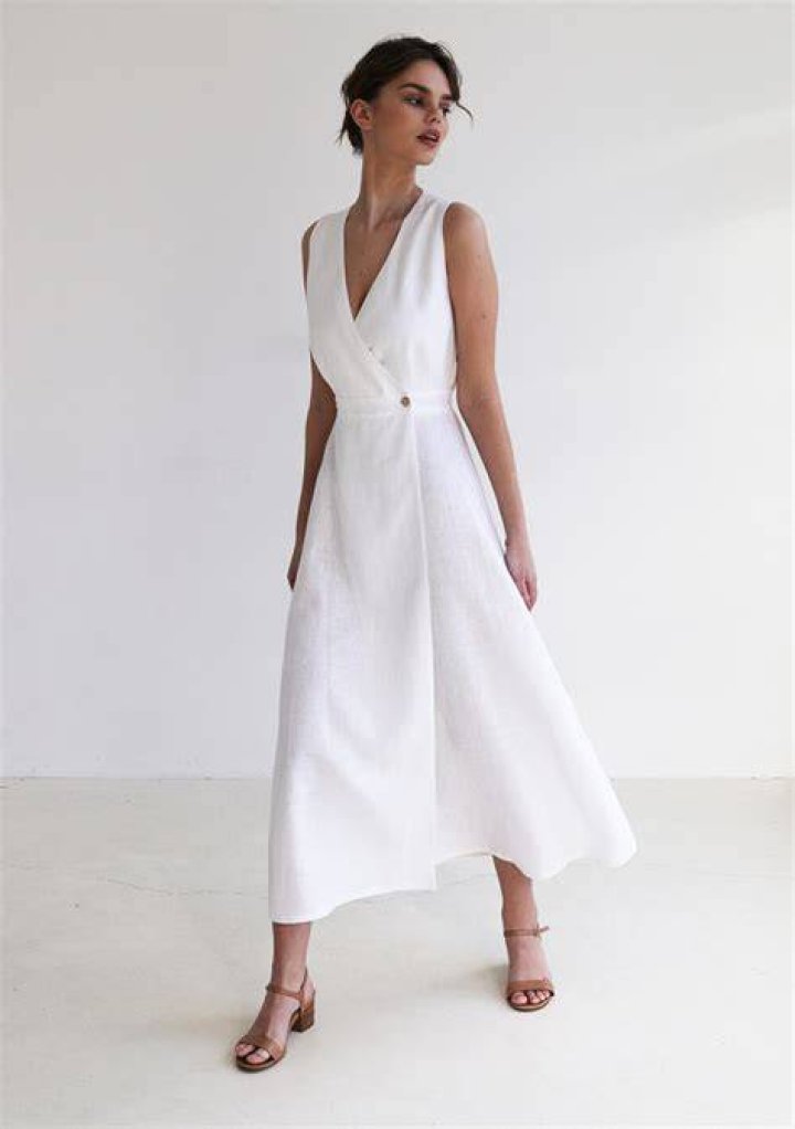 Elegant white linen boho maxi dress for summer beach ceremony