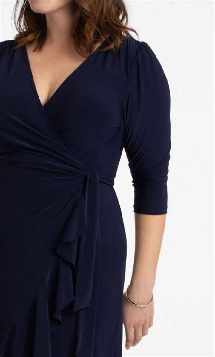 Plus size wrap dress in floral print flattering silhouette