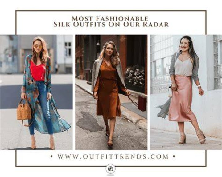 Stylish outfit of a silk camisole tucked into cream wide-leg trousers, accessorized with gold jewelry
